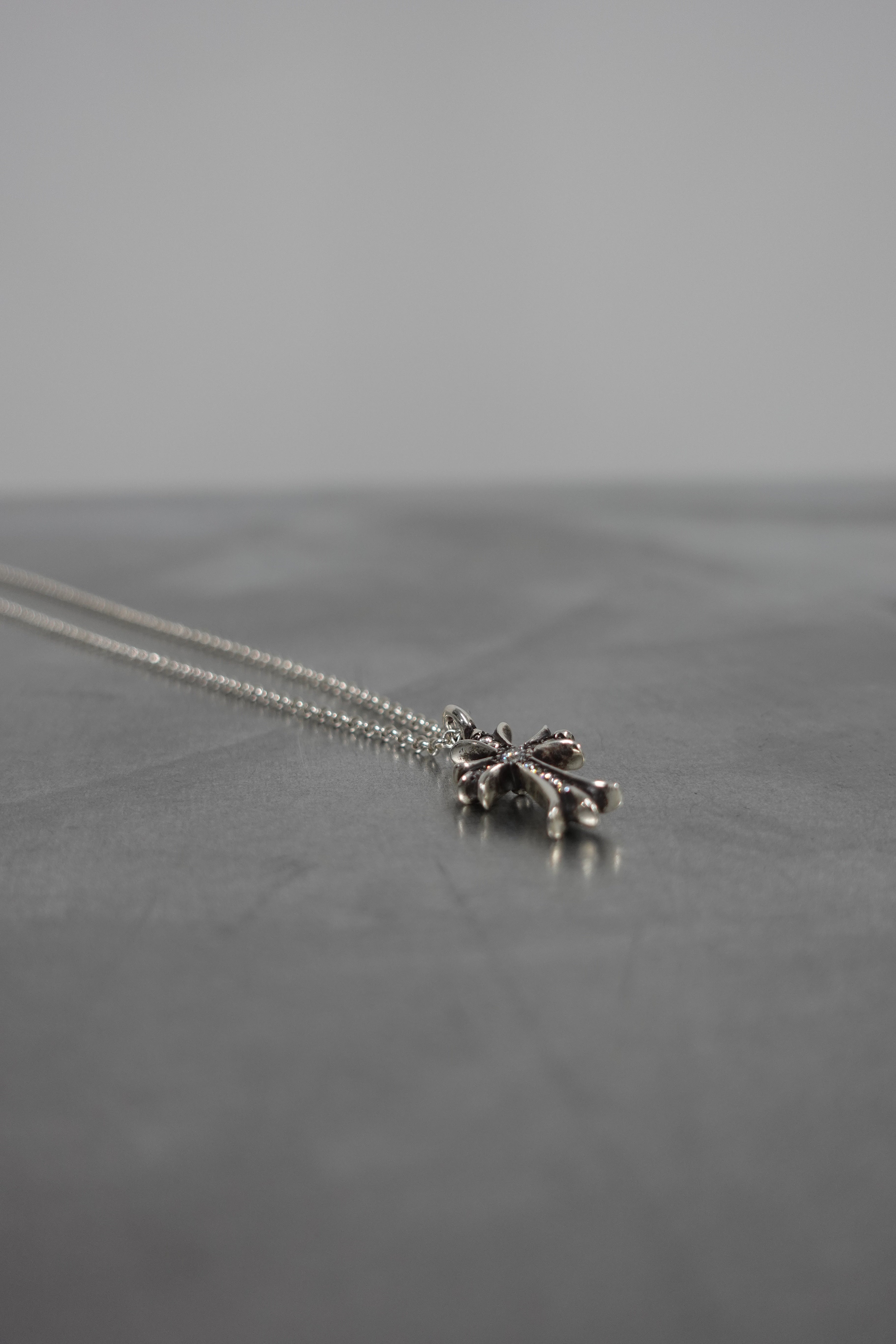 PAVE DIAMOND TINY CROSS PENDANT